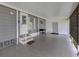 Spacious carport featuring a covered area, exterior door, and access to the main house at 349 Mariner Dr, North Port, FL 34287