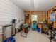Uncluttered garage space featuring organized storage, tools, and access to natural light at 349 Mariner Dr, North Port, FL 34287