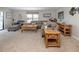 Cozy living room featuring plush seating, neutral décor, and ample natural light at 349 Mariner Dr, North Port, FL 34287