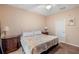 Comfortable bedroom with large bed, matching nightstands, and soft lighting at 3613 Parkridge Cir # 11-201, Sarasota, FL 34243