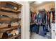 Dual walk-in closets featuring ample shelving for storage at 3613 Parkridge Cir # 11-201, Sarasota, FL 34243