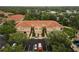 Well-maintained townhomes boast beautiful orange tile roofs, garages, landscaping, and a private community at 3613 Parkridge Cir # 11-201, Sarasota, FL 34243