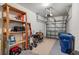 Spacious two car garage with storage shelving, and all the space you need for parking at 3613 Parkridge Cir # 11-201, Sarasota, FL 34243