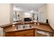 Bright kitchen features stainless steel appliances and a view of the open living area at 3613 Parkridge Cir # 11-201, Sarasota, FL 34243