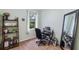 Comfortable office space with a large window, desk, and shelving, perfect for remote work or study at 3613 Parkridge Cir # 11-201, Sarasota, FL 34243