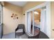 Cozy screened patio with comfortable seating and view into main bedroom at 3613 Parkridge Cir # 11-201, Sarasota, FL 34243