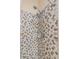 Walk-in shower features designer tile work and modern fixtures at 3613 Parkridge Cir # 11-201, Sarasota, FL 34243