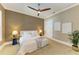 Bedroom features unique lighting and adjacent closet at 4740 Royal Dornoch Cir, Bradenton, FL 34211