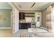 Well-appointed office space with storage, an open doorway and natural light creating a welcoming workspace at 4740 Royal Dornoch Cir, Bradenton, FL 34211