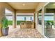 Outdoor kitchen area includes a built-in grill and ample counter space, ideal for alfresco dining and entertaining guests at 4740 Royal Dornoch Cir, Bradenton, FL 34211