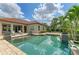 Beautiful pool featuring tiled accents, a serene ambiance, and plenty of space for relaxation at 4740 Royal Dornoch Cir, Bradenton, FL 34211