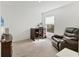 Bright room with a desk, leather chair, and natural light from the window at 4890 Laramie Cir, North Port, FL 34286