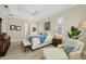 Spacious bedroom with plantation shutters and tray ceilings, filled with natural light at 5018 Bella Terra Dr, Venice, FL 34293