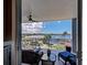 Private balcony with seating offers stunning views of the water at 516 Tamiami S Trl # 303, Nokomis, FL 34275
