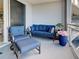 Inviting balcony with comfortable seating, perfect for enjoying the view at 516 Tamiami S Trl # 303, Nokomis, FL 34275
