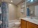 Bright bathroom featuring a shower/tub and vanity at 516 Tamiami S Trl # 303, Nokomis, FL 34275
