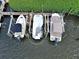 Overhead shot highlighting one of the boat slips, equipped with a lift for easy boat storage and maintenance at 516 Tamiami S Trl # 303, Nokomis, FL 34275