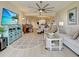 A large living room featuring comfortable seating, modern decor, and an open floor plan at 516 Tamiami S Trl # 303, Nokomis, FL 34275