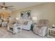 A cozy living room featuring comfortable seating, stylish decor, and plenty of natural light at 516 Tamiami S Trl # 303, Nokomis, FL 34275