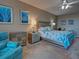 Light-filled main bedroom features coastal decor, plush carpet, and contemporary furnishings at 516 Tamiami S Trl # 303, Nokomis, FL 34275