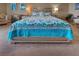 Well-lit main bedroom features coastal decor, neutral walls, and soft carpet at 516 Tamiami S Trl # 303, Nokomis, FL 34275