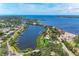 Aerial view of harbor-front homes and boat docks at 5207 5Th Avenue Nw Dr, Bradenton, FL 34209