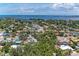 Aerial view of neighborhood homes near a body of water at 5207 5Th Avenue Nw Dr, Bradenton, FL 34209