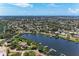 Aerial view of neighborhood homes near a river at 5207 5Th Avenue Nw Dr, Bradenton, FL 34209