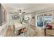 Dining room with view of kitchen and sliding doors to outdoor patio at 5207 5Th Avenue Nw Dr, Bradenton, FL 34209