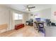 Office featuring a work station, hardwood floors, and natural light at 5207 5Th Avenue Nw Dr, Bradenton, FL 34209