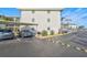 Covered parking spots with landscaping at 708 Tamiami S Trl # 115, Venice, FL 34285