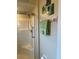 Bathroom close up showing walk-in shower with glass doors, toilet, and towel rack at 7201 L Pavia Blvd # 7201, Venice, FL 34292