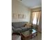 Cozy living room with comfortable seating and natural light at 7201 L Pavia Blvd # 7201, Venice, FL 34292
