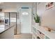 Stylish entryway with elegant decor and stainless steel appliances nearby at 7505 Wexford St, North Port, FL 34287