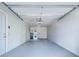 Clean, spacious garage with laundry area and ample storage at 7505 Wexford St, North Port, FL 34287