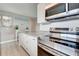 Modern kitchen featuring stainless steel appliances and granite countertops at 7505 Wexford St, North Port, FL 34287