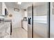 Modern kitchen features stainless steel appliances and granite countertops at 7505 Wexford St, North Port, FL 34287
