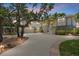 Beautiful home exterior featuring a curved driveway, mature landscaping, and a charming architectural design at 755 Eagle Point Dr, Venice, FL 34285