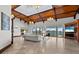 Bright and airy living room boasting expansive water views, high ceilings, and ample seating at 755 Eagle Point Dr, Venice, FL 34285
