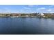 Beautiful community lake view with a dock and scenic walking paths, perfect for relaxation and recreation at 7582 Lyncrest St, North Port, FL 34287