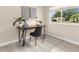 Bright office space with a modern desk setup with natural light from a window overlooking the outdoors at 7582 Lyncrest St, North Port, FL 34287
