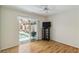 Bedroom with ceiling fan and sliding door access to screened-in lanai and pool at 1110 Southlake Ct, Venice, FL 34285