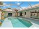 A serene outdoor pool with a screened enclosure and a patio for enjoying leisure time at 1110 Southlake Ct, Venice, FL 34285