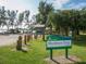 A welcome sign to Sarasota County's Blackburn Point Park, complete with lush grass and shady trees at 1164 Beachcomber Ct # 19, Osprey, FL 34229