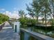 Community water access, featuring convenient dock and fishing or seating platforms near the water at 1164 Beachcomber Ct # 19, Osprey, FL 34229