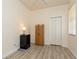 Cozy bedroom with a closet, wood flooring, and ample natural light at 11954 Tempest Harbor Loop, Venice, FL 34292
