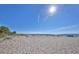 Expansive beach with soft sand and clear blue water, perfect for sunbathing and seaside activities at 120 Hourglass Dr, Venice, FL 34293