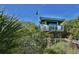 Picturesque lifeguard stand nestled among lush greenery, ensuring safety and vigilance along the shoreline at 120 Hourglass Dr, Venice, FL 34293