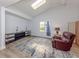 Bright living room with vaulted ceiling, skylight, and stylish furnishings at 120 Hourglass Dr, Venice, FL 34293