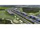 Aerial view of luxury condo community situated along a scenic golf course and natural wetlands at 12140 Wellen Golf St # 202, Venice, FL 34293